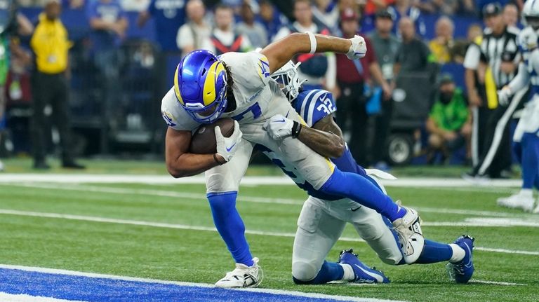 Stafford overcomes injury to throw winning TD pass to Nacua in OT to give  Rams 29-23 win over Colts – KGET 17