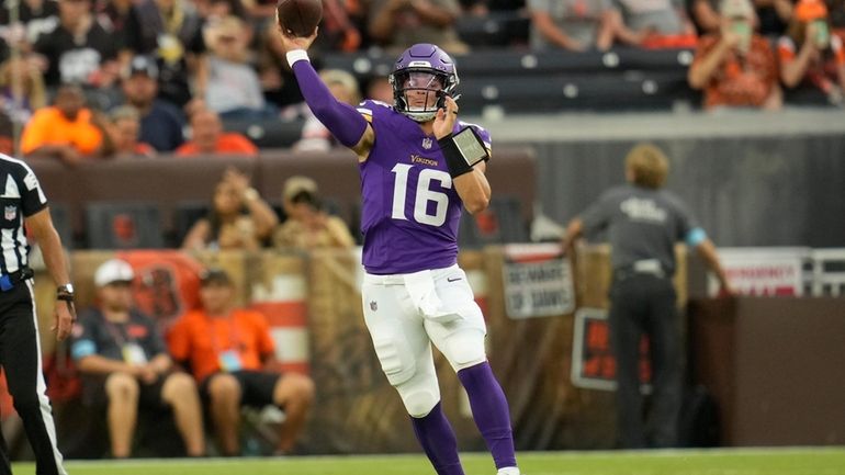 Minnesota Vikings quarterback Jaren Hall (16) throws for a touchdown...