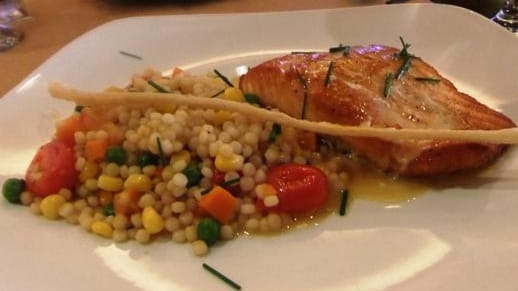 Pan-seared salmon with Israeli couscous at Sally's Cocofe, Huntington