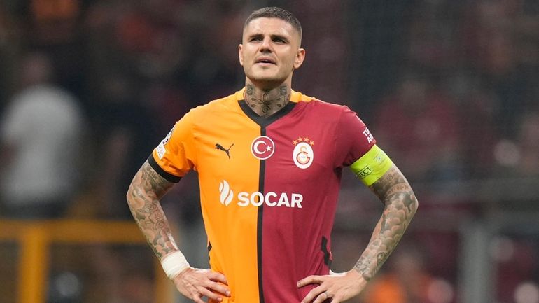 Galatasaray's Mauro Icardi, walks off the pitch after his team...