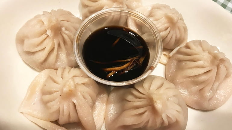 Shanghai-style soup dumplings are an appetizer at Master Chef Best...
