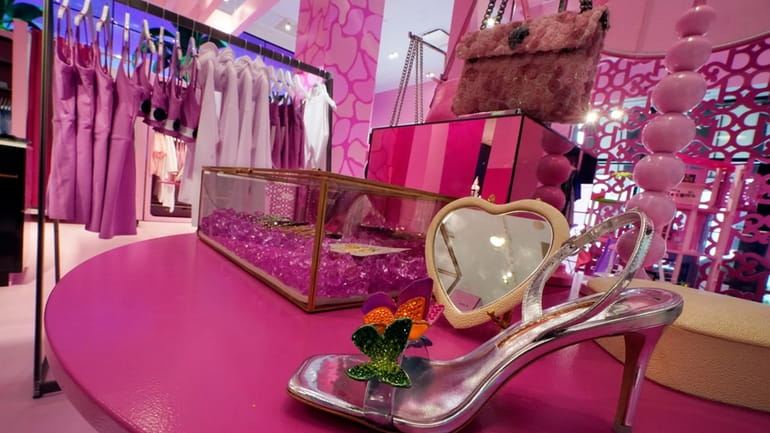 Barbie-themed merchandise is displayed in a special section at Bloomingdale's,...