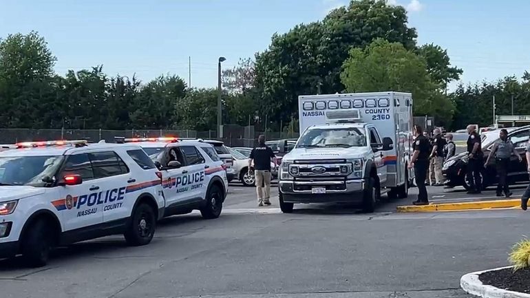 Nassau police at the scene in Carle Place on Tuesday...