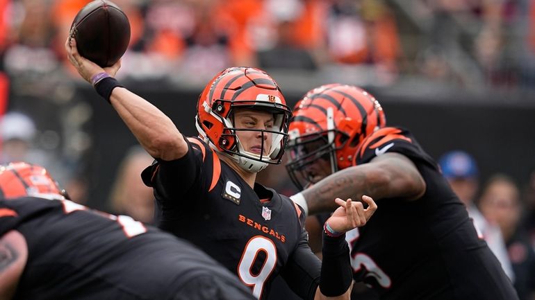 Cincinnati Bengals quarterback Joe Burrow throws during the second half...