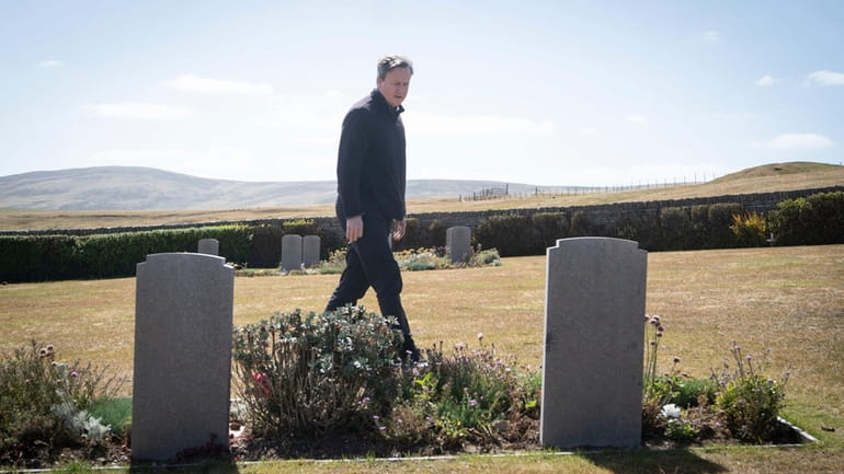 Foreign Secretary Lord David Cameron visits San Carlos Cemetery on...