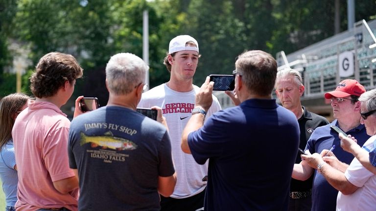 Georgia's Charlie Condon speaks to the media before an NCAA...