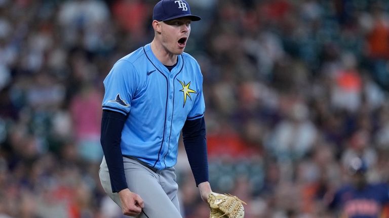 Tampa Bay Rays relief pitcher Pete Fairbanks celebrates after striking...