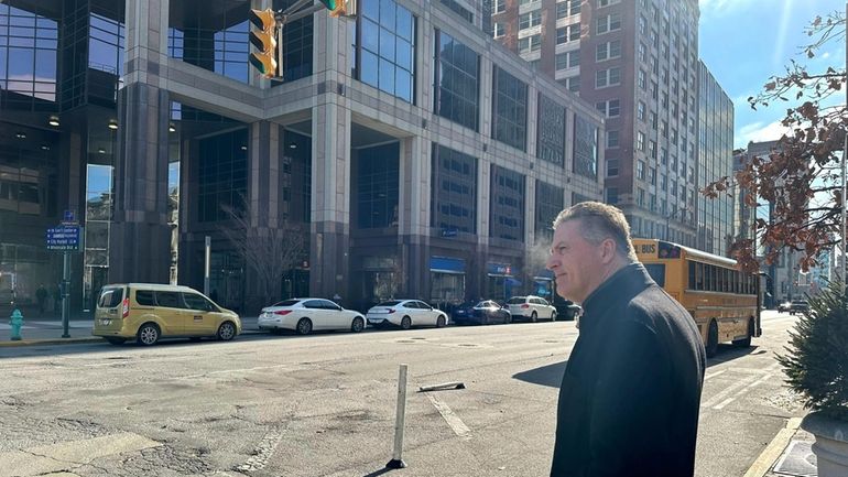 Former Indiana state Rep. Sean Eberhart, 57, leaves a hearing...