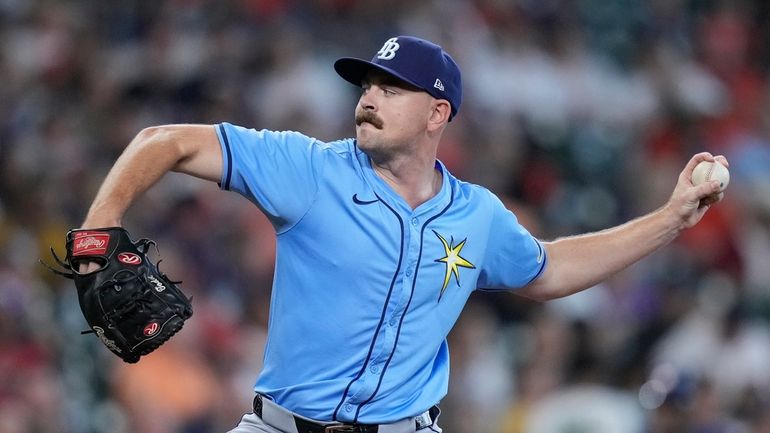 Tampa Bay Rays relief pitcher Tyler Alexander delivers during the...