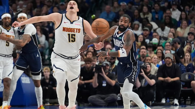 Kyrie Irving's running left-hander at the buzzer lifts Mavs over Nuggets  107-105 - Newsday