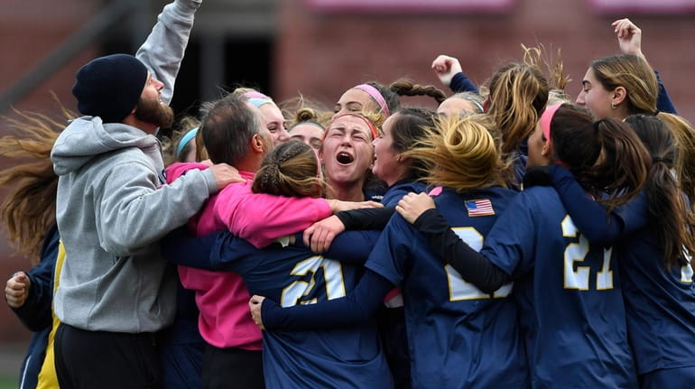 Massapequa celebrates their win against Shenendehowa in the 2021 NYSPHSAA...