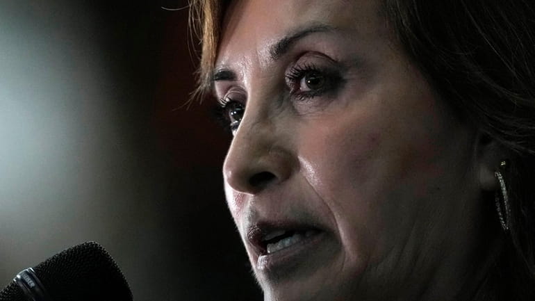 Peru's President Dina Boluarte talks to the press at the...