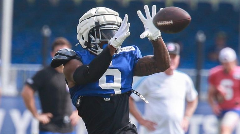 Giants wide receiver Malik Nabers catches a pass during a...