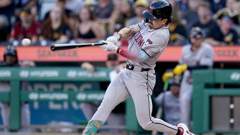 Arizona Diamondbacks' Corbin Carroll hits a triple during the first...