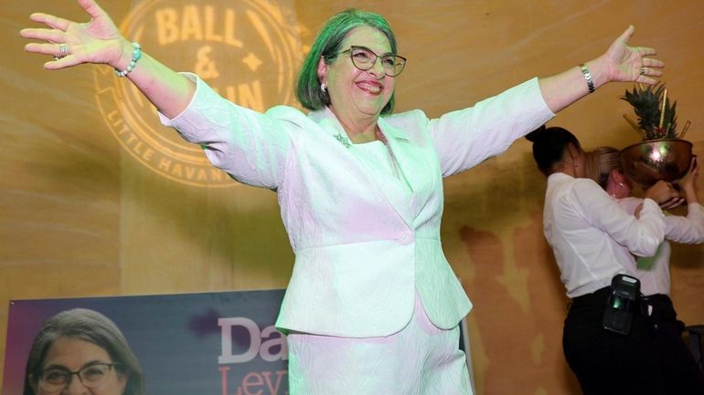 Miami-Dade County Mayor Daniella Levine Cava celebrates during her election...