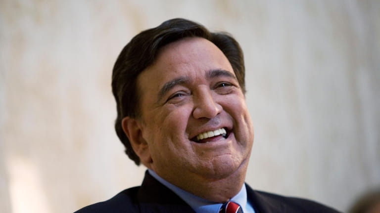 New Mexico Governor Bill Richardson, laughs during a press conference...