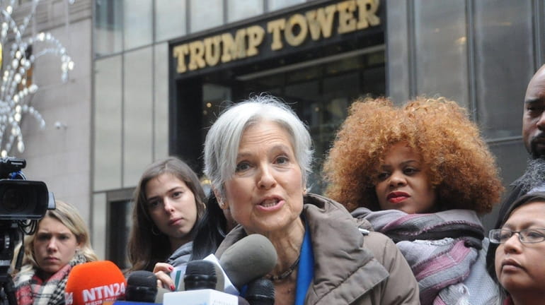 Jill Stein and supporters hold a news conference in front...
