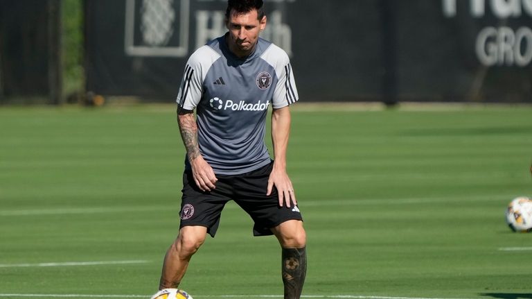 Inter Miami forward Lionel Messi works out with teammates at...