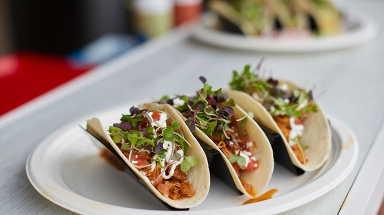 Mole Poblano chicken tacos with roasted chicken, pico de gallo,...