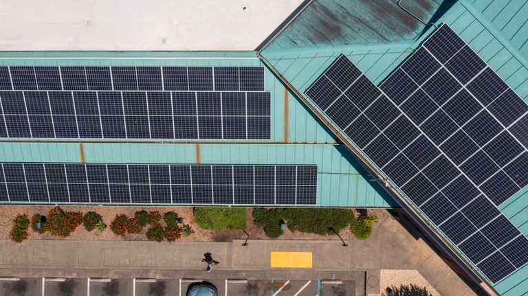 Solar panels mounted on the roof of Alliance Medical Center...