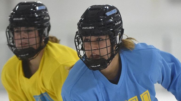 Grace Dima (right), LIU women's ice hockey player from Huntington...