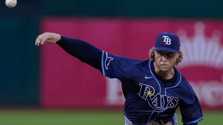 Tampa Bay Rays' Shane Baz pitches to an Oakland Athletics...