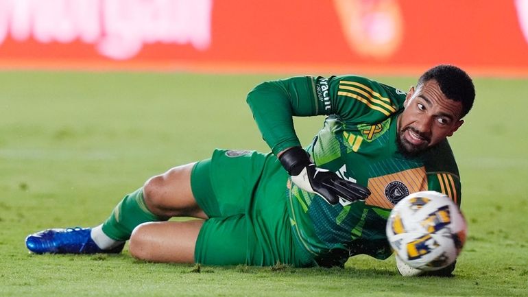 Inter Miami goalkeeper Drake Callender stops a kick on goal...