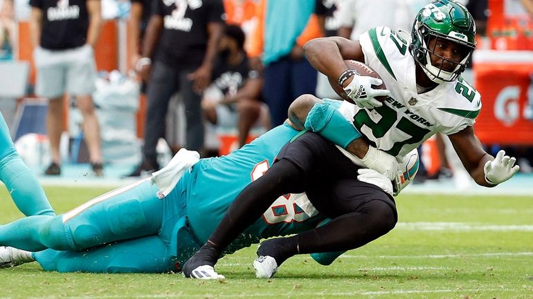 Jets lose season finale, Dolphins clinch playoff berth