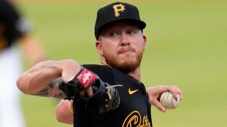 Pittsburgh Pirates starting pitcher Bailey Falter delivers during the second...