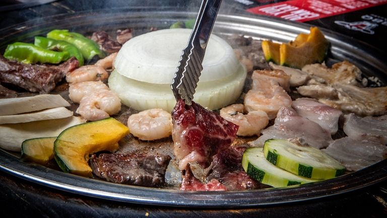 The offerings at the table grill at JBBQ & Shabu...