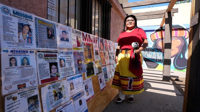 Grassroots advocate Reva Stewart walks outside the headquarters at Drumbeat...