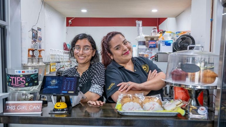 Naz Aminuddin, 20, of Bellerose, Queens, left, and Rivers Cafe...