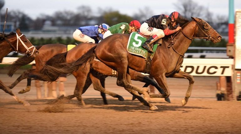 Christophe Clement-trained Tonalist rolling home down the center of the...