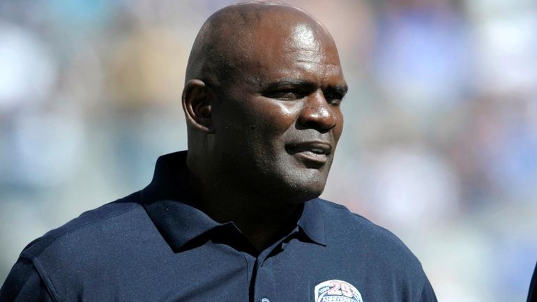 Former Giants linebacker Lawrence Taylor looks on during a 25-year anniversary Super...