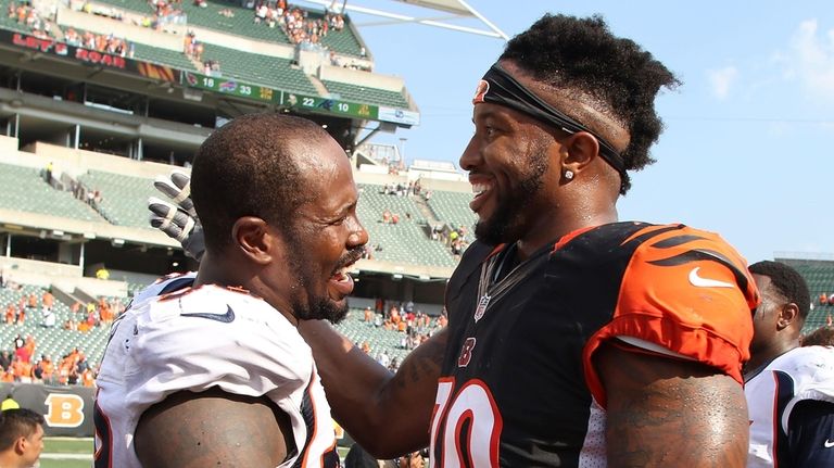 Von Miller #58 of the Denver Broncos and Cedric Ogbuehi...