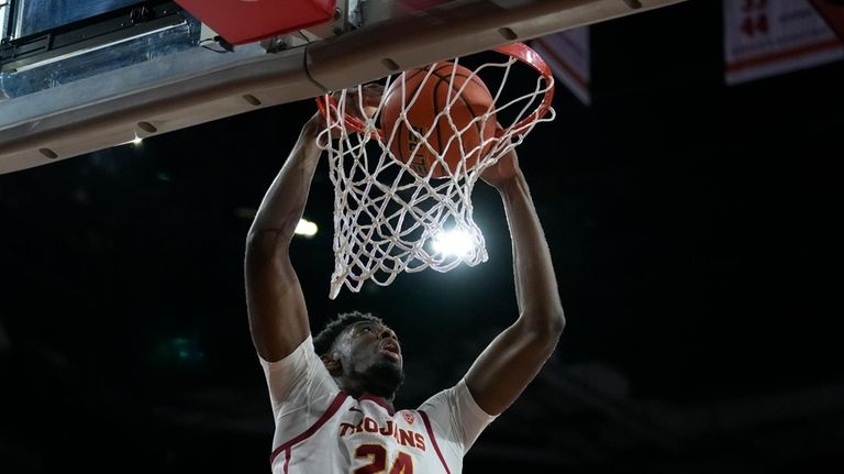 Southern California forward Joshua Morgan dunks during the first half...