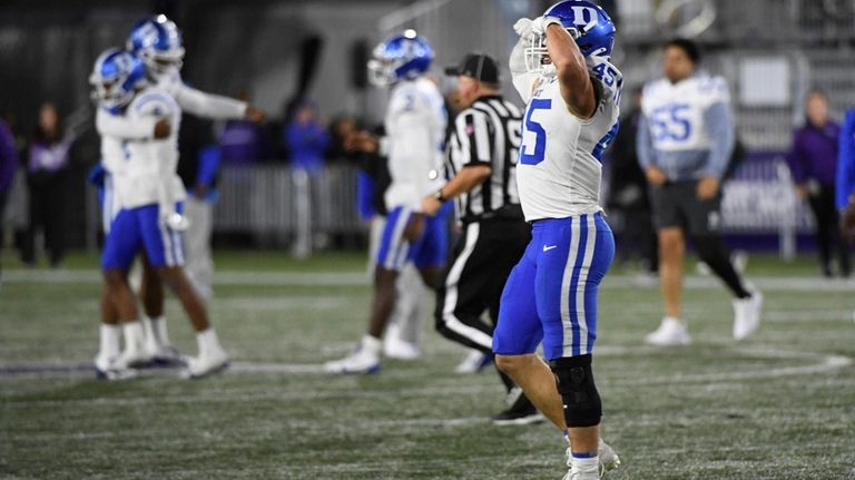 Duke linebacker Ozzie Nicholas (45) celebrates after beating Northwestern at...