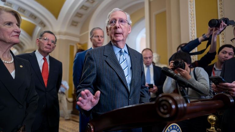 Senate Minority Leader Mitch McConnell, R-Ky., center, joined from left...