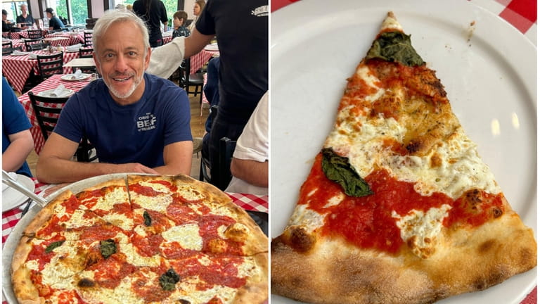 Scott Vogel enjoys the margherita pizza at Grimaldi's in DUMBO,...