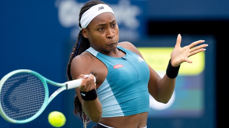 United States' Coco Gauff hits a return to China's Yafan...