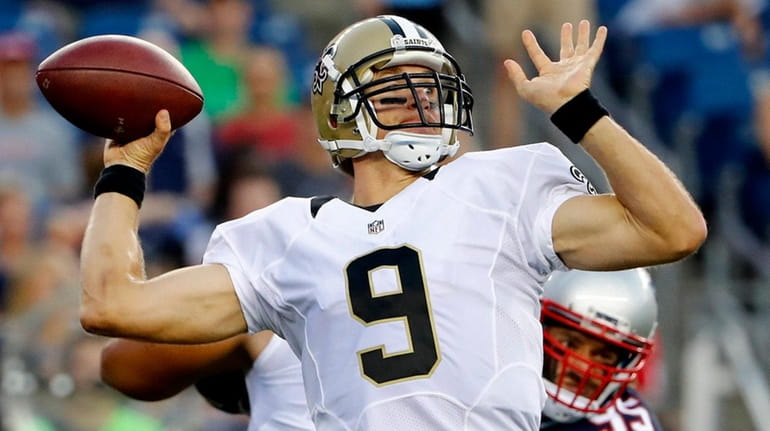 New Orleans Saints quarterback Drew Brees passes during the first...