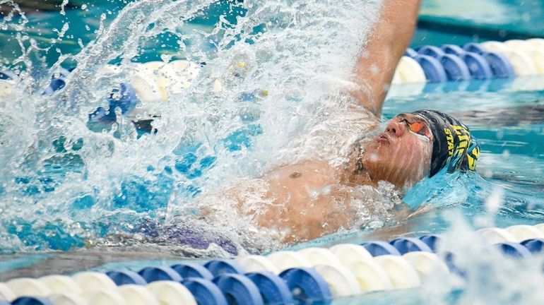 St. Anthony's Aaron Mendoza in 100-yard backstroke at state Federation...