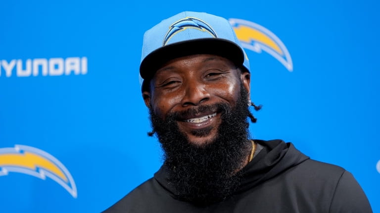 Los Angeles Chargers linebackers coach NaVorro Bowman speaks during a...