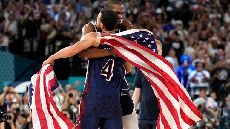 United States' Stephen Curry, left, and United States' Kevin Durant...