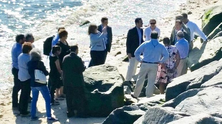 Local, state and federal officials met at Asharoken Beach to...