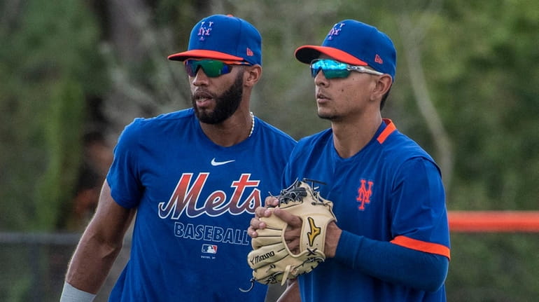 Mets infielders Amed Rosario, left, and Andres Gimenez during a spring...