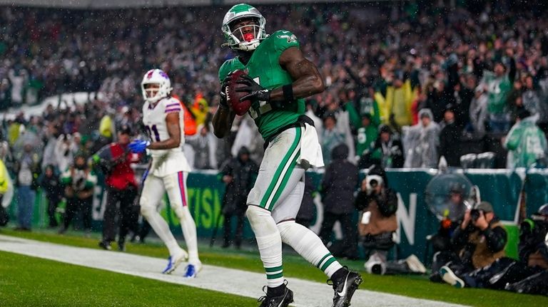 Philadelphia Eagles wide receiver A.J. Brown celebrates after scoring against...