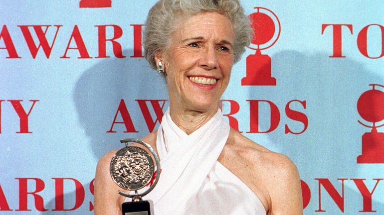 Actress Frances Sternhagen holds her award for best featured actress...