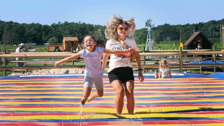 Analee Anderson and her mother, August Anderson, of Aquebogue, race...