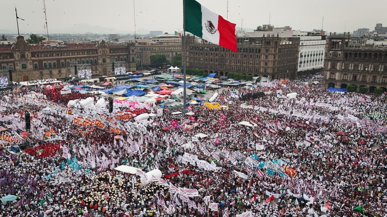 Supporters of presidential candidate Claudia Sheinbaum crowd the Zocalo during...